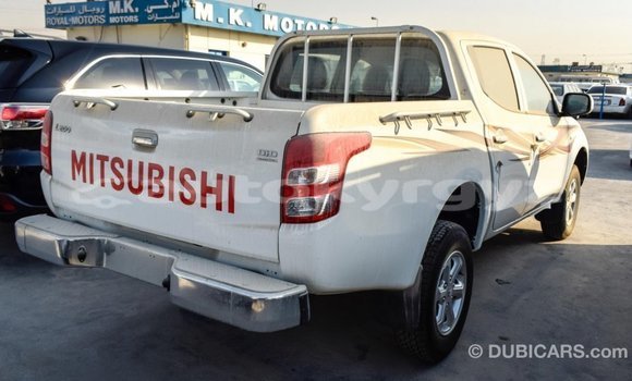 Buy Import Mitsubishi L200 White Car in Import - Dubai in Batken Buy Import Mitsubishi L200 White Car in Import - Dubai in Batken