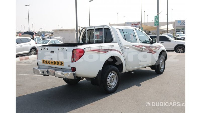 Big with watermark mitsubishi l200 batken import dubai 2011