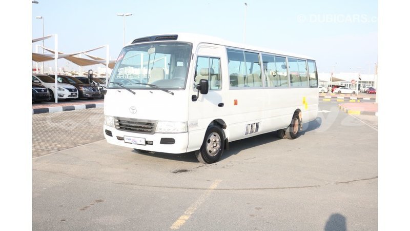 Big with watermark toyota coaster batken import dubai 2226