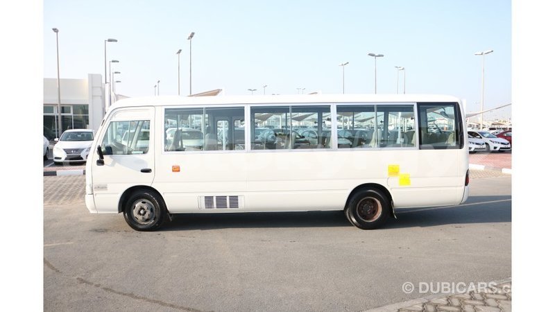 Big with watermark toyota coaster batken import dubai 2226