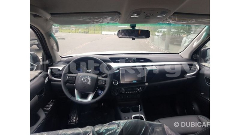 Big with watermark toyota hilux batken import dubai 3673