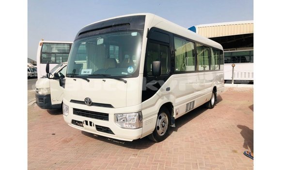 Buy Import Toyota Coaster White Car in Import - Dubai in Batken