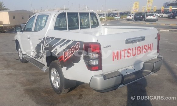Buy Import Mitsubishi L200 White Car in Import - Dubai in Batken Buy Import Mitsubishi L200 White Car in Import - Dubai in Batken