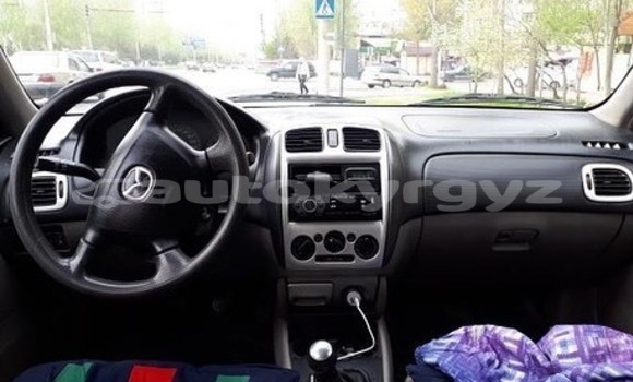 Buy Used Mazda 323 Red Car in Bishkek in Bishkek Buy Used Mazda 323 Red Car in Bishkek in Bishkek
